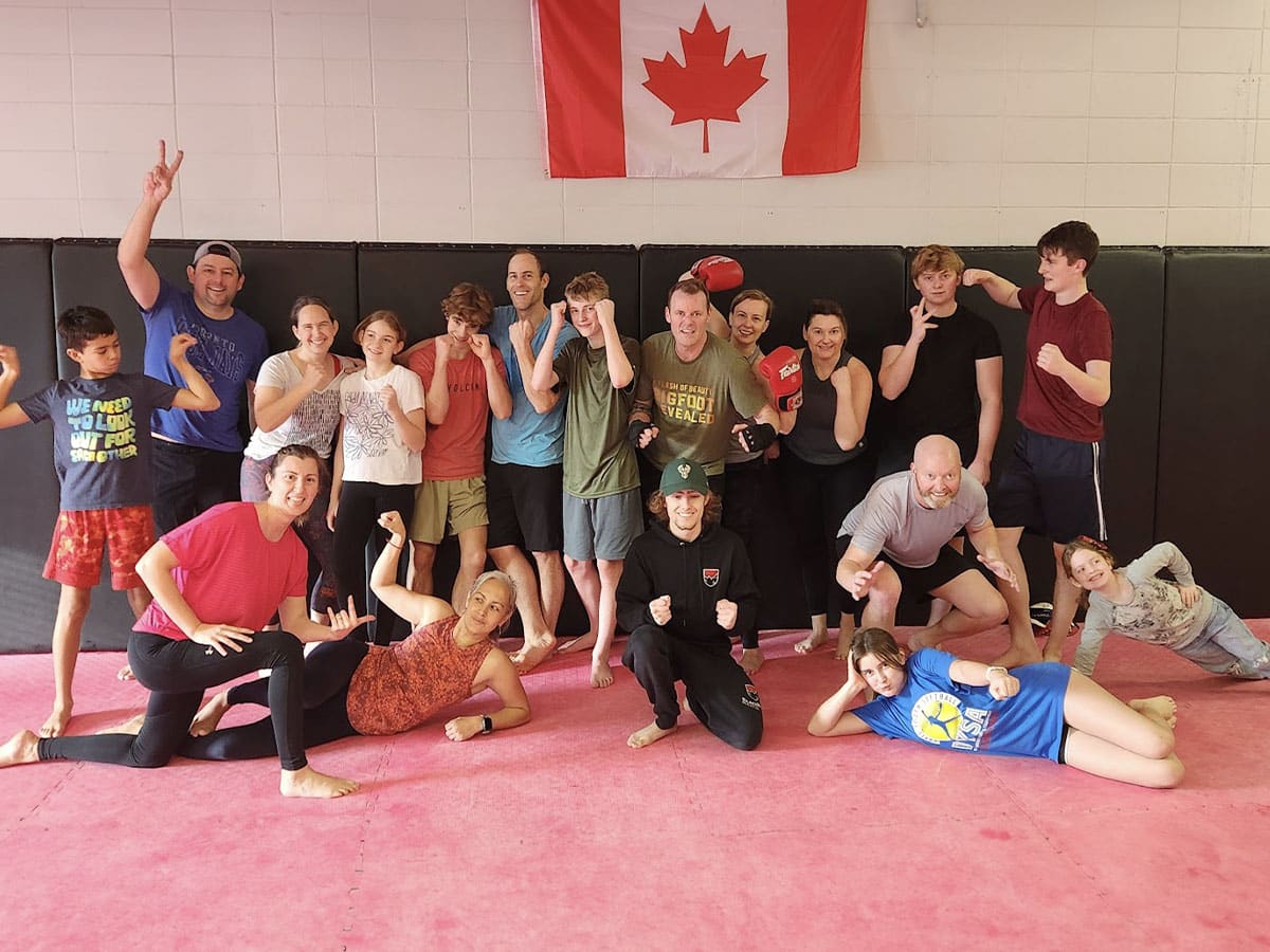 A group photo of smiling students training at Black Rock Martial Arts.